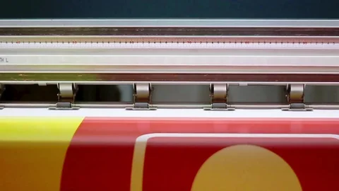 Wide format digital printing. Self adhesive film. Red color. Video stock 80436552