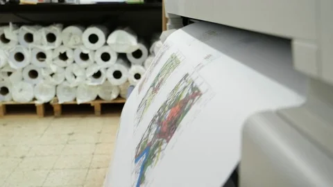 Wide format printer prints and cuts draft drawing Stock Footage 77170699