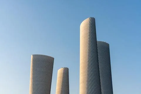 A wide geometric composition of high-tech Lusail Plaza Towers in Lusail City. Stock Photos