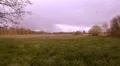 Wide grassy landscape at a sunny cloudy day 4k or 4k+ Resolution