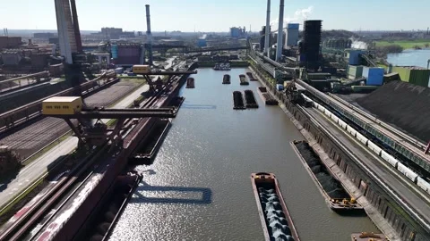 Wide harbor overview with barges and raw material yard Stock Footage 331206152