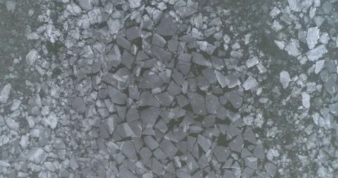 Wide high angle footage of ice floating in sea. Camera moving forward. Stock Footage 105456502