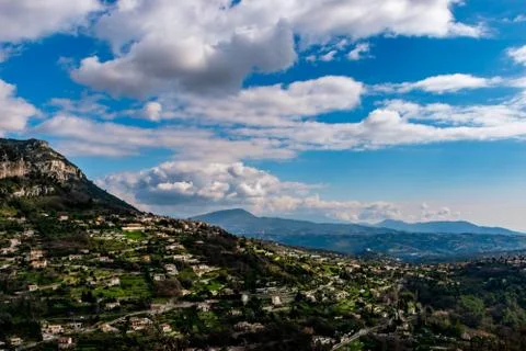 A wide / high angle panoramic view of Saint-Jeannet buildings and other towns Stock Photos