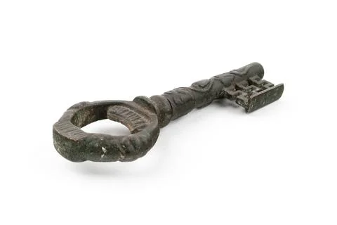 Wide high angle studio shot of very old metal vintage decorative key with word Stock Photos
