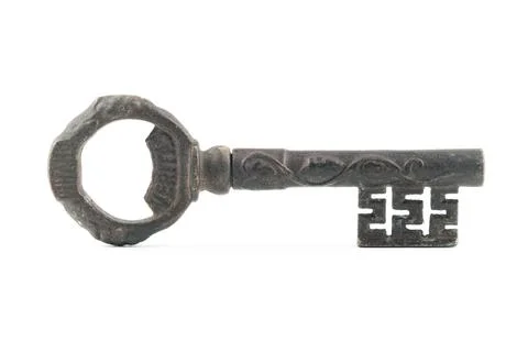 Wide high angle studio shot of very old metal vintage decorative key with word Stock Photos