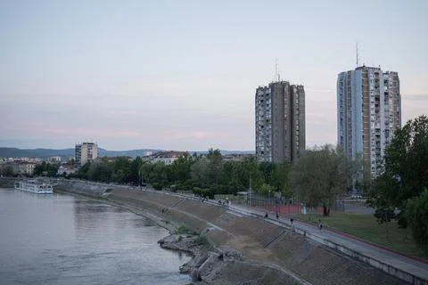 Wide high-angle view of the Danube River and paved quay promenade in Novi Sad Stock Photos