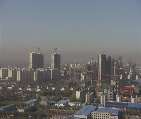 Wide high angle view of many high-rises under construction Stock Footage 86745973