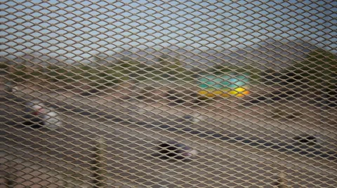 Wide Highway Traffic through Overpass Grid Sped-up Stock Footage 31234037