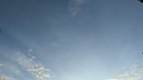 A wide horizontal shot captures a peaceful blue sky during early morning. S.. Video stock 329261695