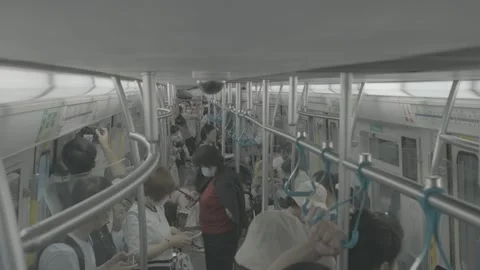 Wide Interior of Crowded Beijing Subway Train Car Stock Footage 341457549