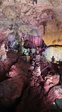 Wide Interior of Illuminated Limestone Cave in China Stock Photos