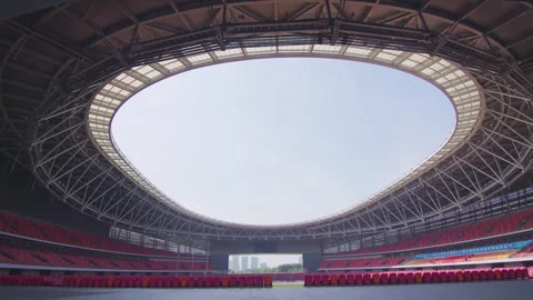 Wide Interior Shot of Empty Modern Stadium with Red Seats Vidéo 335470807