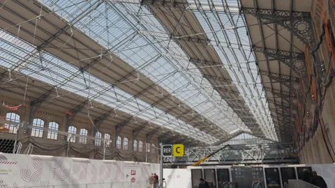 Wide interior shot of Paris Austerlitz train station with roof renovation in Stock Footage 306639644