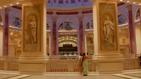 A wide interior view of the Trafford Centre. Massive columns with classical Vídeos de archivo 327538739