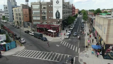 Wide intersection in the Bushwick mural district of Brooklyn Stock Footage 154614287