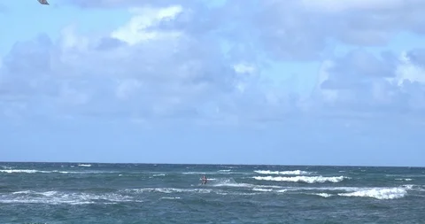 Wide Kite Surfer Riding Waves, 4K60p Stock Footage 101071017