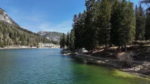 Wide Lake View with Pine Forests and Distant Dolomites Stock Footage 341650879
