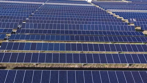 Wide low altitude view of large solar panel field Stock Footage 327812300