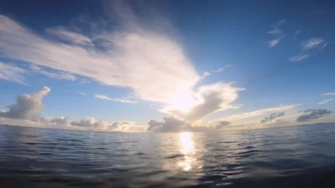 Wide low angle horizontal pane view on top surface of oceanic scene look out to  Stock Footage 253459783