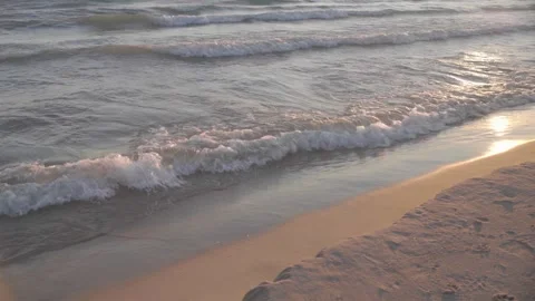 Wide Low-Angle Shot of Gentle Lake Michigan Waves at Golden Hour, Evanston Beach 動画素材 326291809