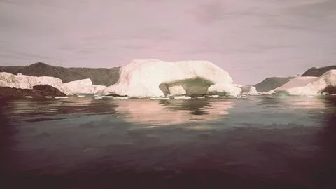 A wide low angle view of melting sea ice floes in still waters of Arctic Illustrazione stock