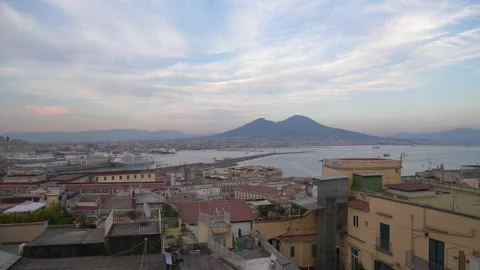 Wide of Mount Vesuvius behind the harbor in Naples, Italy in the evening Видео 239472191