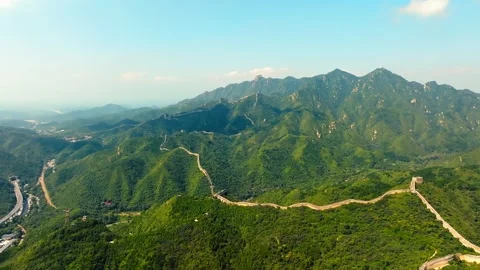 Wide mountain Great Wall panorama above a winding valley road 스톡 동영상 346576983