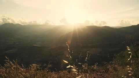 Wide mountain landscape washed by soft sunrise light Stock Footage 336569307