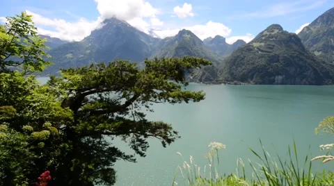 Wide mountain panorama. Cloudy sky over lake. Stock Footage 64992846