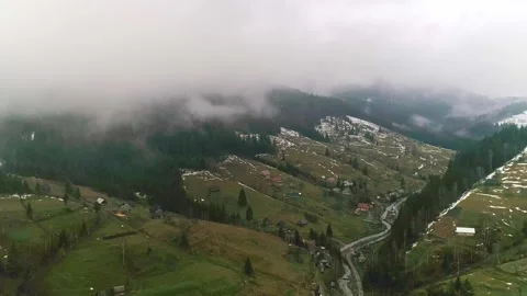 Wide mountain valley with thick mist, village nature landscape Stock Footage 282251079