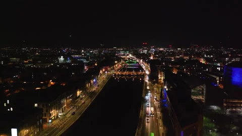 Wide Nighttime View of Dublin's River and Illuminated Streets Stock Footage 332444775