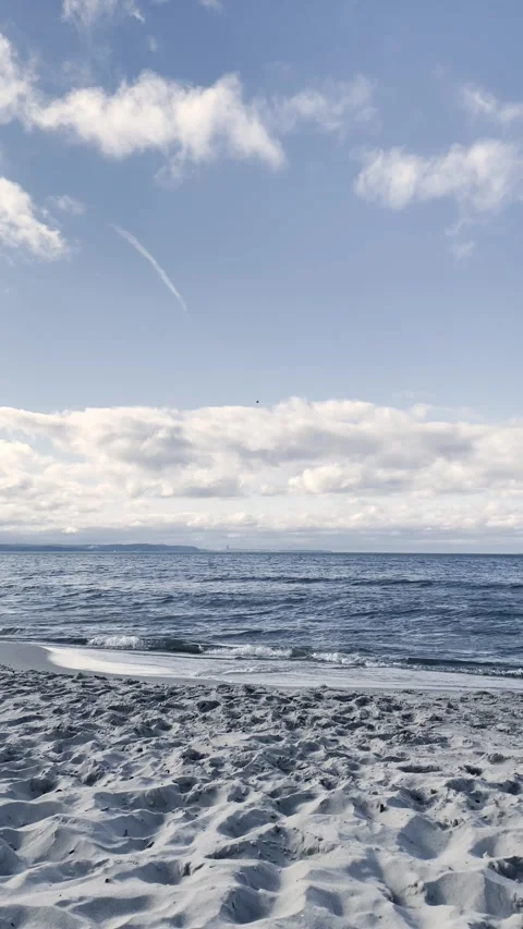 Wide Ocean Horizon with Gentle Waves Under Blue Sky Stock Footage 340163953