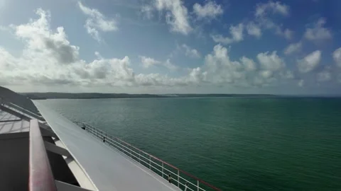 Wide Ocean View with a Distant Island Stock Footage 299923874