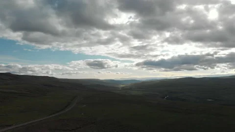 Wide Open Land Heavy Clouds Spinning Drone Stock Footage 186770308