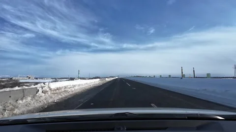 Wide open winter highway with big sky in Hokkaido Stock Footage 333229948