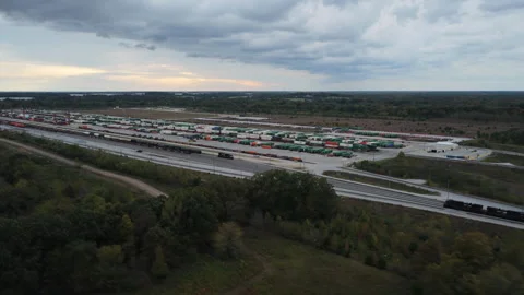 Wide Overview of Intermodal Rail Facility Beneath Cloudy Skies Stock Footage 337714195