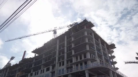 Wide pan up and left view of a large building under construction  in St. Petersb Stock Footage 264556288