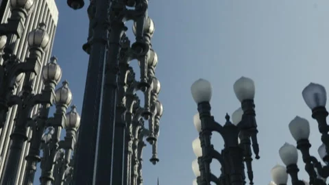 Wide pan down of the iconic artistic lamppost installation in Los Angeles Stock Footage 322037495