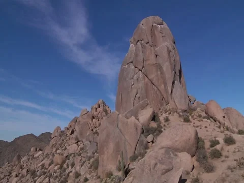 Wide Pan Up to Rock Structure in Desert Stock Footage 50439098