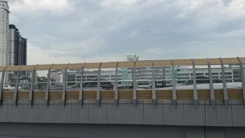 Wide panning shot of the almost completed RTS Link elevated track structure in Stock Footage 339100375