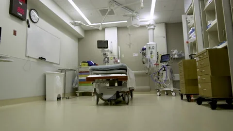 Wide Panning Shot Of Empty Bed In An Emergency Room In High Speed Stock Footage 206899017