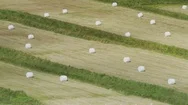 Wide Panning Shot Of Hay Bales In Farm Field / Vik, Vestur-Skaftafellssysla Stock Footage