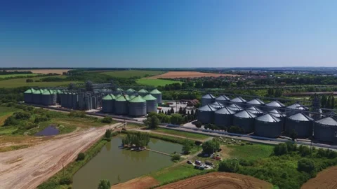 Wide panoramic aerial view of big industrial grain elevator complex Stock Footage 341284461