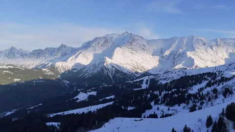 Wide panoramic shot of the snow-covered Mont Blanc Massif in the French Alps Stock Footage 346680623