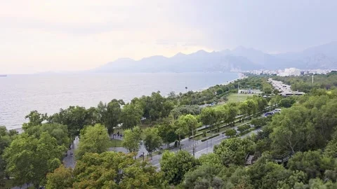 Wide panoramic view of Antalya's coastal green zone with forested park, blu.. Stock Footage 338133085