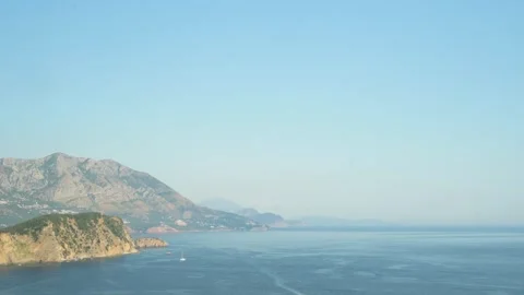 Wide panoramic view of Budva Bay and St. Nicholas Island in Montenegro duri.. Stock Footage 341867975