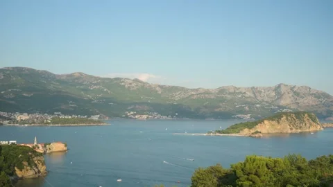 Wide panoramic view of Budva Bay with Budva Old Town and St. Nicholas Islan.. Stock Footage 341870321