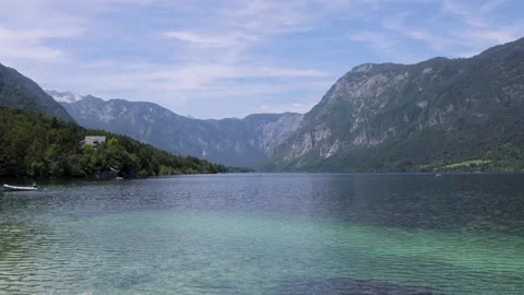 Wide Panoramic View of Lake Bohinj with Julian Alps, Slovenia Stock Footage 335540414