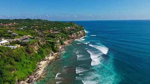 Wide Panoramic View of Ocean Waves Crashing Against Cliff Shores 스톡 동영상 340659015
