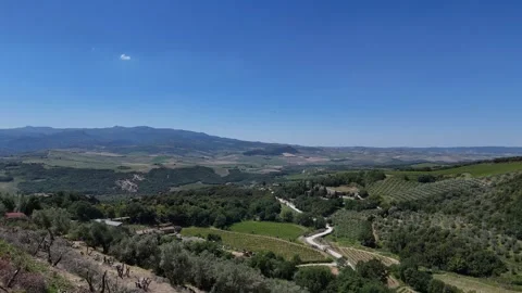 Wide Panoramic View Over Rolling Hills and Distant Mountain Basin Stock Footage 344629157